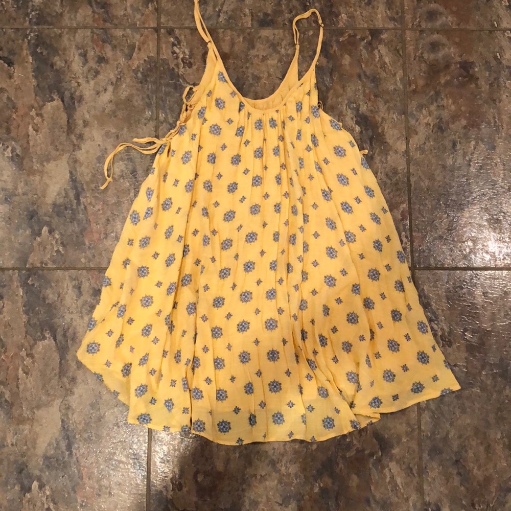 Yellow dress with blue flowers
